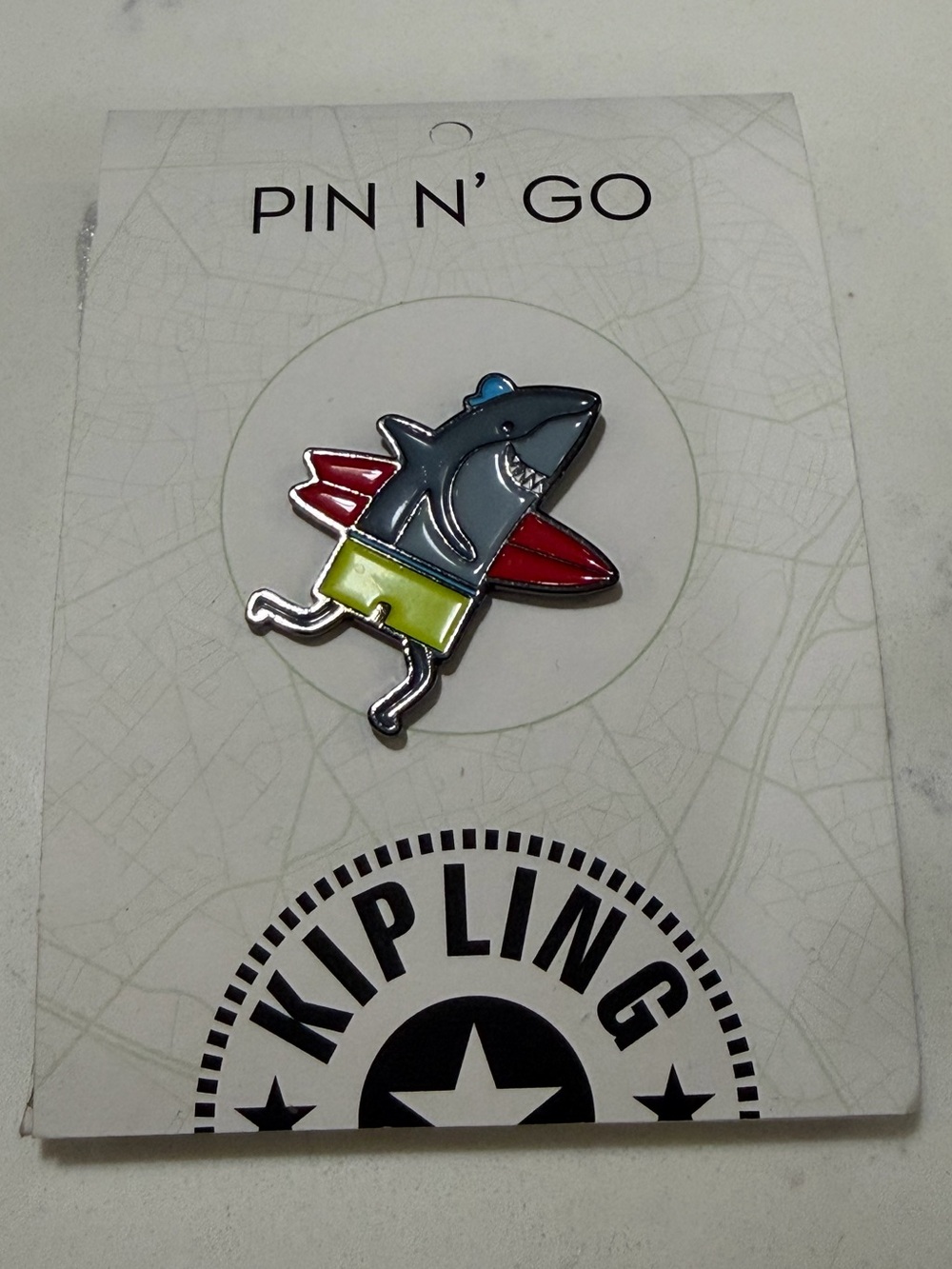 Kipling Shark Enamel Pin — Blue, Red, White